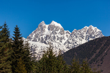 Fototapeta na wymiar View of Mount Ushba. located in the Svaneti region of Georgia. Travel.