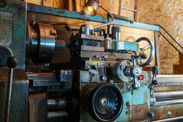 Old metal lathe in the workshop, metalworking, machine tools