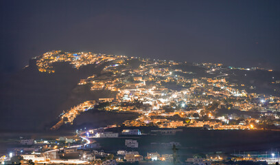 Fototapeta premium Aerial view of Santorini island coast at night