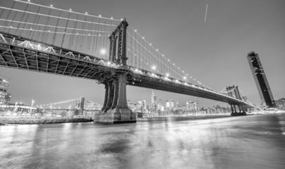 Fototapeta na wymiar The Brooklyn and Manhattan Bridges at night from Broolyn Bridge Park, New York City in winter.