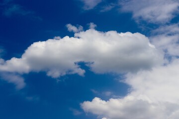 Naklejka na ściany i meble The cloudscape in the bright blue sky.