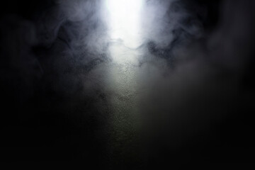 Light and shadow with white haze on a black and dark background. - obrazy, fototapety, plakaty