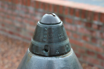 detail of a british first worldwar artillery shell percussion fuze. detonator with engraved lot and type number
