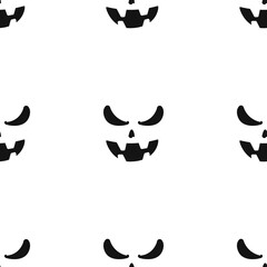 Repeated pumpkin face pattern. Vector.