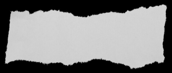 Torn paper on black