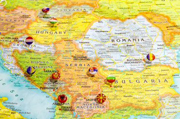 Close up view of Balkan peninsula on geographical globe, Map shows capitals countries Serbia -...