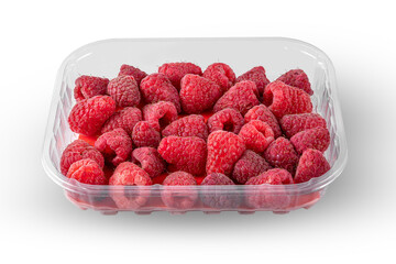 ripe red raspberries in a plastic box isolated on a white background