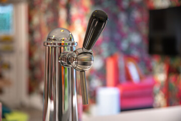Close-up view of beer tap handle