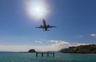 Greece. Corfu. A passenger plane flies for a landing near the city of Kerkyra.