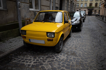 yellow car parked in Lviv Ukraine on August 6, 20221