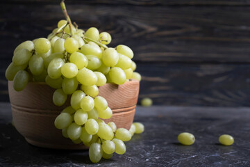 fresh grapes on wooden background