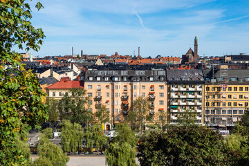Fototapeta na wymiar View of buildings and roofs of the city from Stockholm Observatory. Stockholm panoramic view.