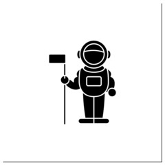 Astronaut glyph icon. Spaceman keeps flag. Visit note. Planet research. Mars landing concept. Filled flat sign. Isolated silhouette vector illustration