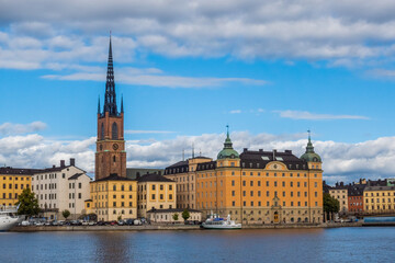 Fototapeta premium Panoramic view of Gamla Stan, sea and Stockholm old town from Mariaberget Observation Deck