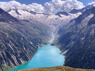 The turquoise lake, alps and glacier from Olpererhutte in Tyrol