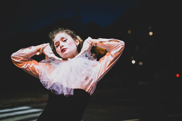 The girl with makeup of the mime. improvisation. Suit for Halloween. mime shows different emotions....