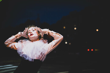 The girl with makeup of the mime. improvisation. Suit for Halloween. mime shows different emotions....