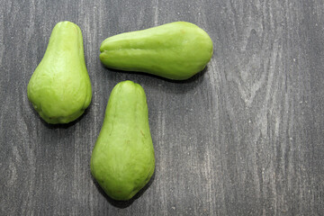 Vegetable chayote green squash fresh, natural raw, ready to cut and cook, very nutritious and dithetical
