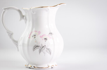 Ceramic jug on white background