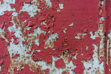 Rust and old paint on a metal surface