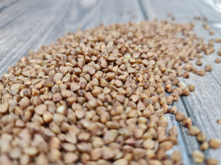 Natural fresh buckwheat groats. Buckwheat in the close-up.