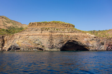 Lipari island (Aeolian archipelago), Messina, Sicily, Italy: view of the seacoast with caves.