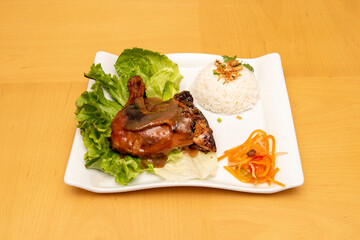 Inasal Grilled Chicken Filipino Recipe with White Rice, Vegetables, and Sauce