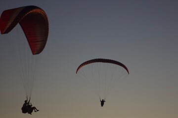 Parachute flight in the sunset