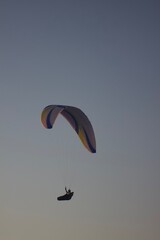 Parachute flight in the sunset