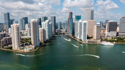 Miami, FL USA - 9-18-2021: Aerial view of the Miami River entrance in between Brickell Key and downtown Miami.