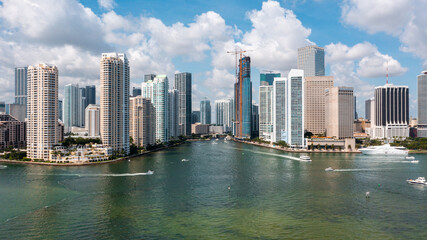 Fototapeta na wymiar Miami, FL USA - 9-18-2021: Downtown Miami cityscape shot over the ocean.