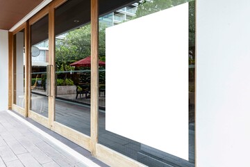 Blank billboards on the glass wall of the entrance to the building