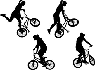 BMX cyclist, woman silhouettes