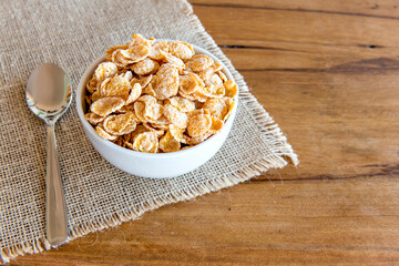 Bowl with cornflakes, healthy breakfast.