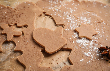 Making Christmas cookies. Raw dough and anise on table, closeup