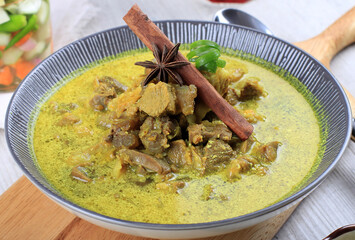 Close Gulai Kambing is Indonesia Traditional mutton curry soup. is a type of food containing rich and spicy.