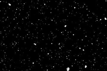 snow fall concept. Falling raindrops or snow against a black background