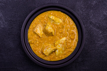 Curry with vegetables, lentils and meat