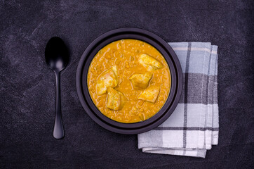 Curry with vegetables, lentils and meat