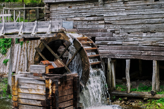 Old water mill, mill wheel on the river