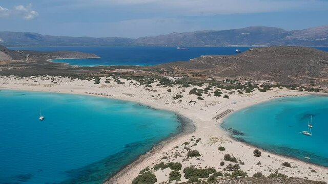 Aerial view of Simos beach in Elafonisos island in Greece. Elafonisos is a small Greek island the Peloponnese with idyllic exotic beaches and crystal clear waters. Laconia, Greece, Europe