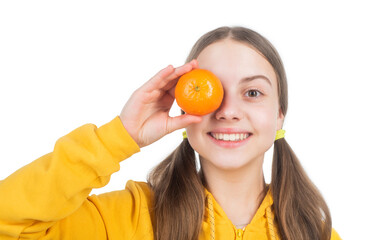 happy teen girl with mandarin citrus fruit. vitamin and dieting. child eating healthy food.