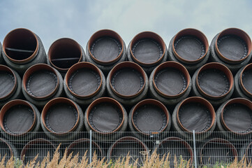 Stacked pipes for the north stream 2 gas pipeline from Russia through the Baltic Sea to Germany at the port of Sassnitz on Rugen in Mecklenburg-Vorpommern, copy space