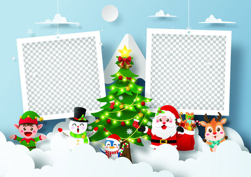 Santa Claus and friend at the snow mountain with blank photo frame