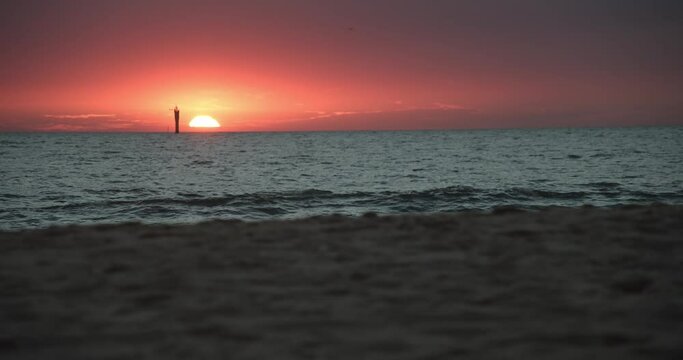 Beautiful sunset on the island Sylt with the beach in the foreground