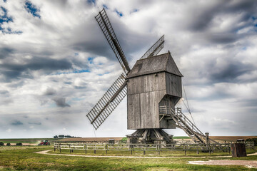 Fototapeta na wymiar old wooden windmill