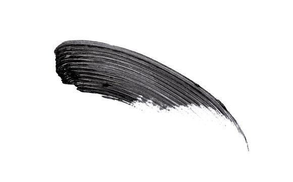 Black mascara brush strokes isolated on white	
