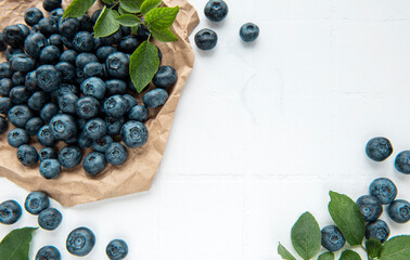 Blueberries on white tile  background