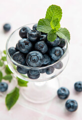 Blueberries on tile background