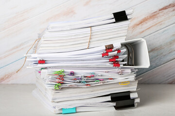 Stack of documents on light background
